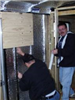 Men Installing Insulation
